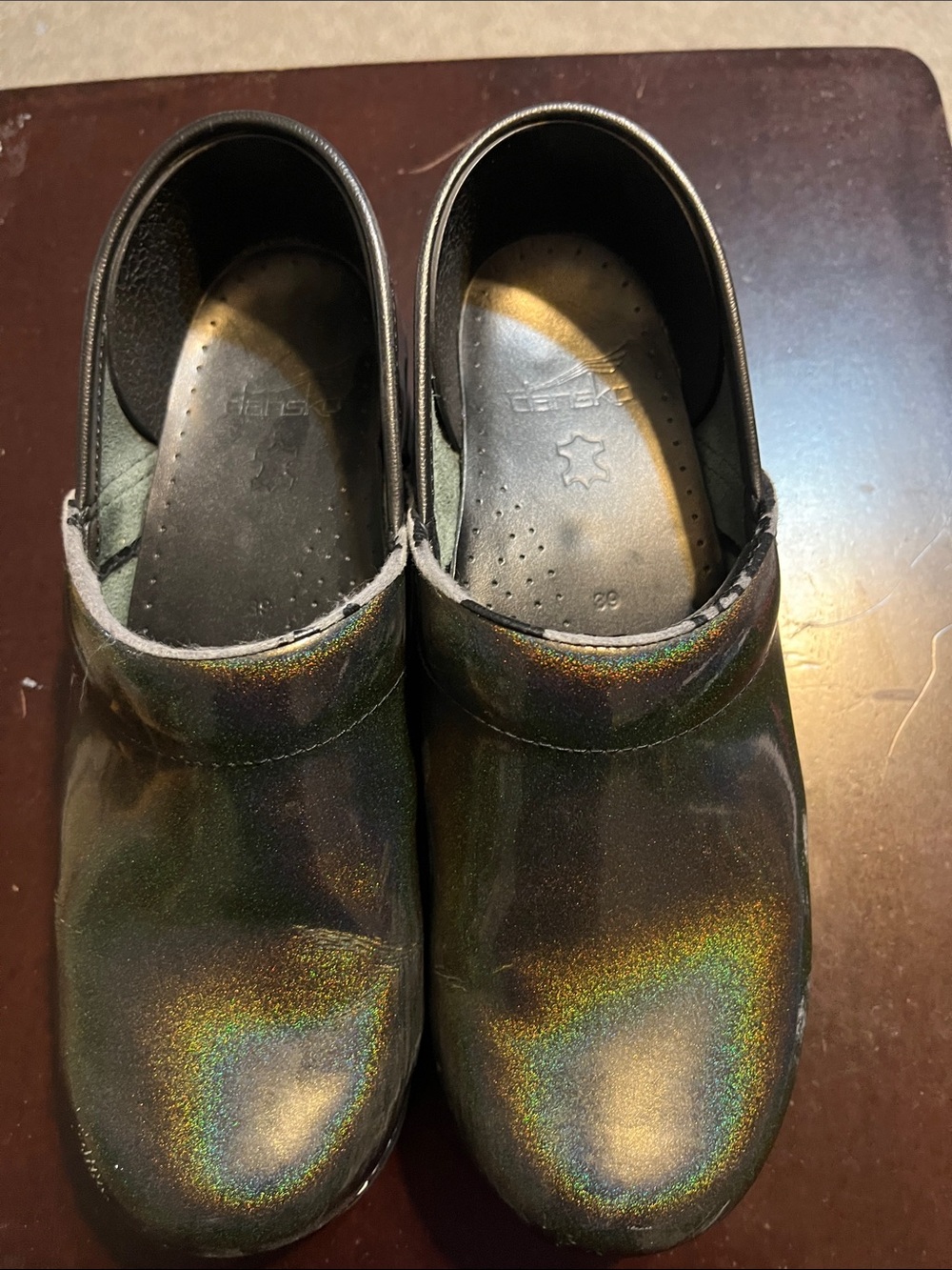 Dansko Women's Holographic Black Clogs